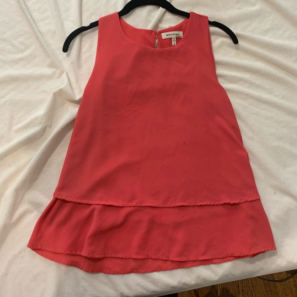 Pink sleeveless blouse